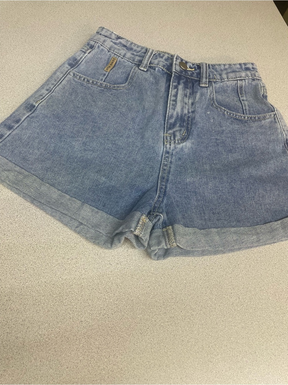Casual High-Rise Light Blue Denim Roll-Cuff Womenโs Shorts